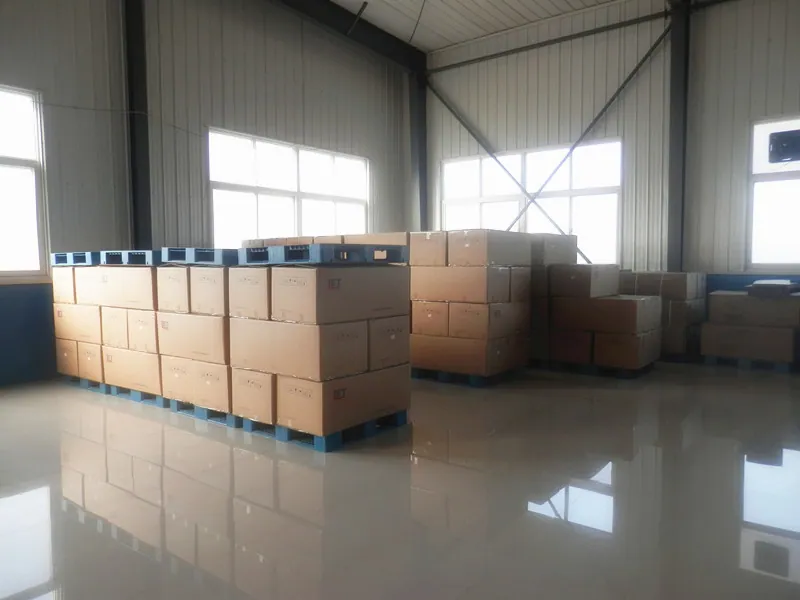 Cardboard cartons stacked on pallets in a warehouse